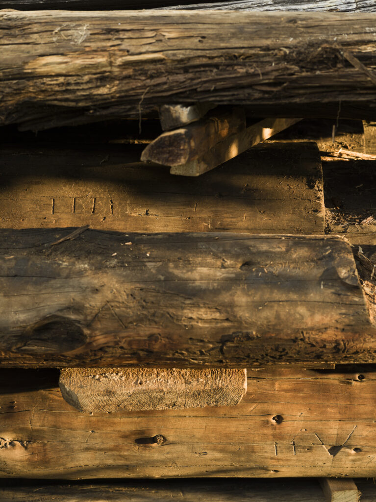 Detail view of the disassembled pieces of the barn.