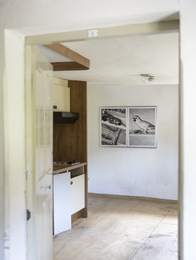 Installation view of black and white photographes.