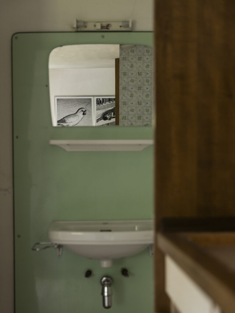 Installation view of black and white photographs.